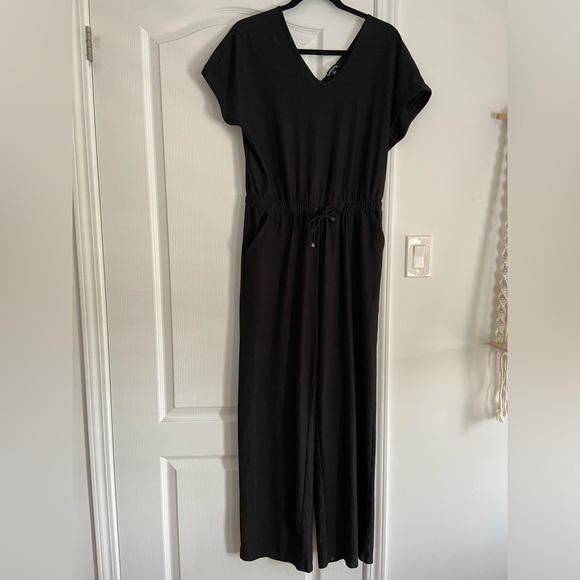 Sansara black jumpsuit.  Size small but fits like a medium - Picture 1 of 5